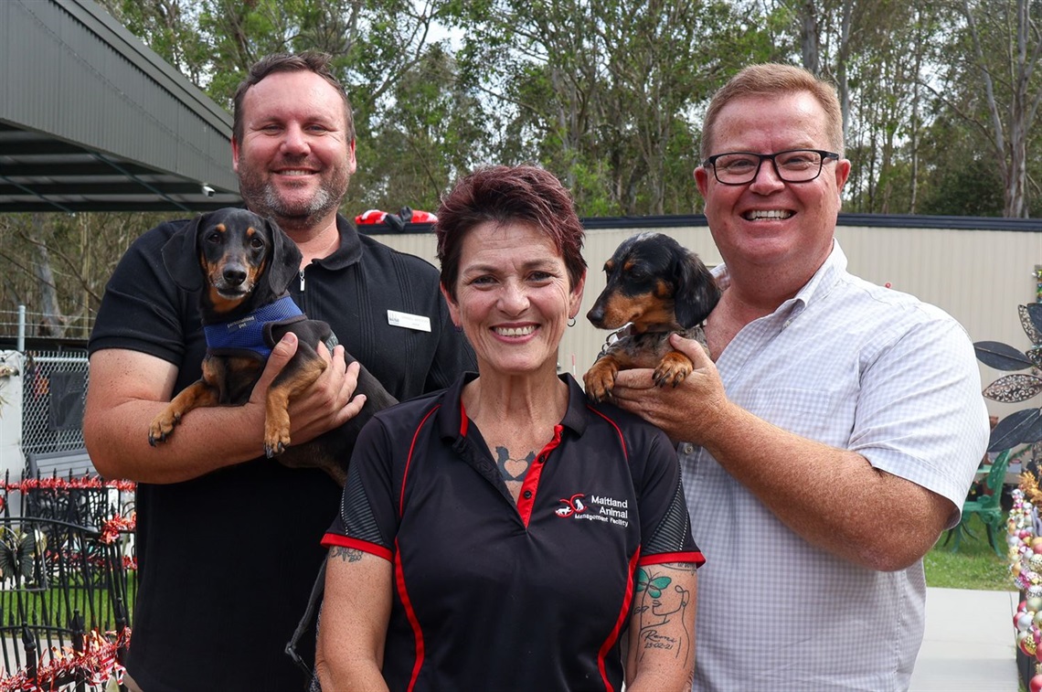 Maitland and Cessnock Mayors Philip Penfold and Dan Watton with Maitland Animal Management Facility staff member Dee Walton.jpg